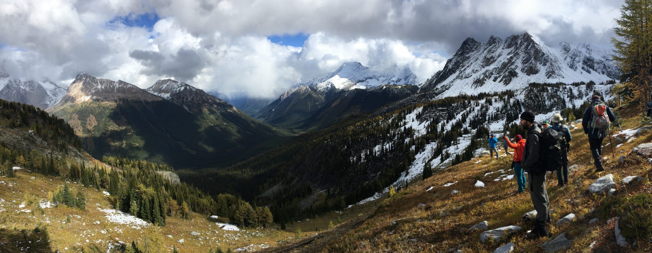 People are hiking in a mountain pass